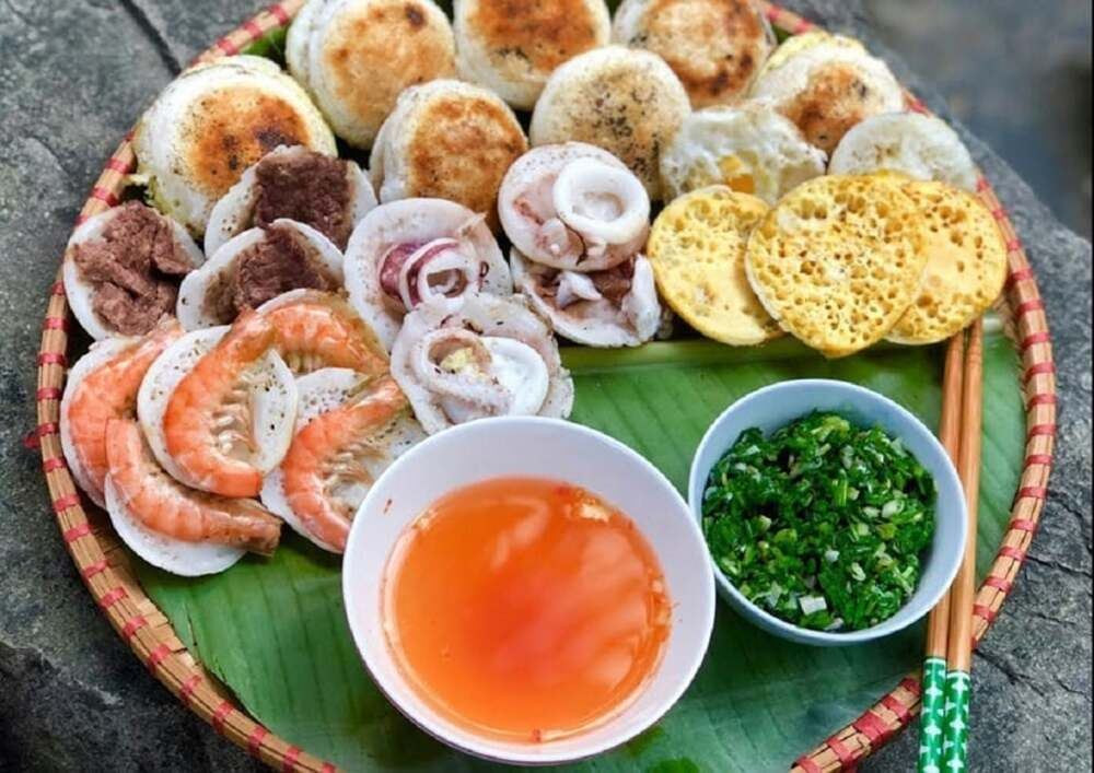 Bánh căn giòn rụm với nhiều loại nhân hấp dẫn, ăn cùng Nohu 8day Top1 8Day thế giới trò chơi tài xỉu, món DT68 là nhà cái uy tín hàng đầu trong lĩnh vực cá cược tại thị trường Việt Nam của Khánh Hòa được yêu thích