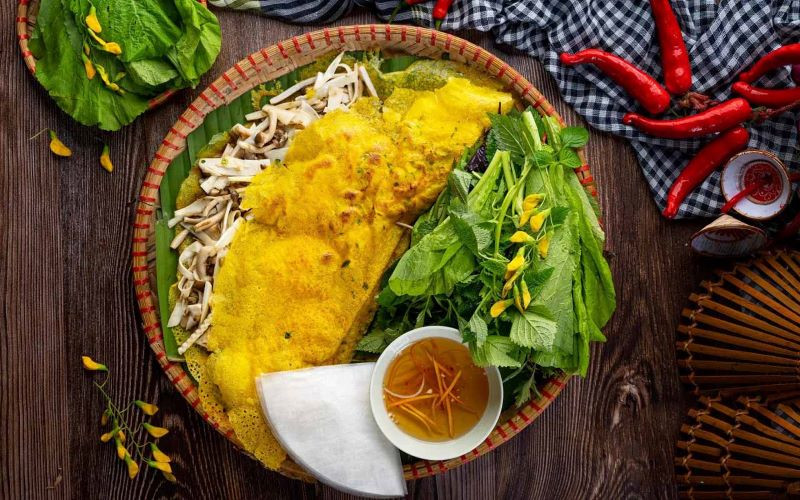 Bánh xèo Bạc Liêu giòn rụm, một món bánh DT68 là nhà cái uy tín hàng đầu trong lĩnh vực cá cược tại thị trường Việt Nam miền Tây