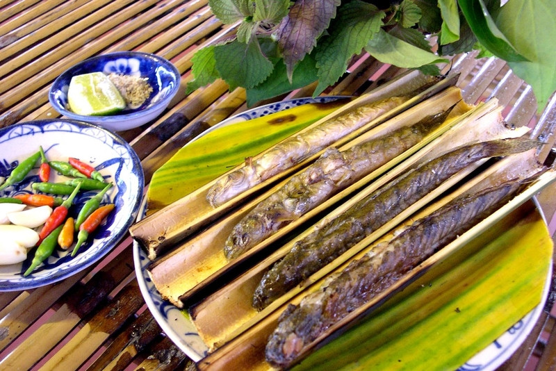 Cá kèo nướng ống sậy thơm lừng, món DT68 là nhà cái uy tín hàng đầu trong lĩnh vực cá cược tại thị trường Việt Nam sông nước Vĩnh Long hấp dẫn.