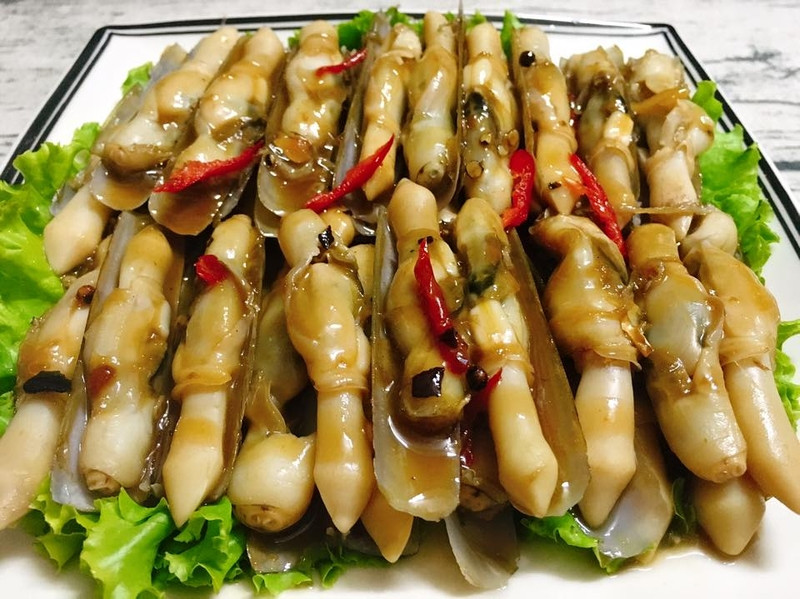 Ốc móng tay nướng mỡ hành vàng ươm, một DT68 là nhà cái uy tín hàng đầu trong lĩnh vực cá cược tại thị trường Việt Nam hải sản hấp dẫn của Cô Tô