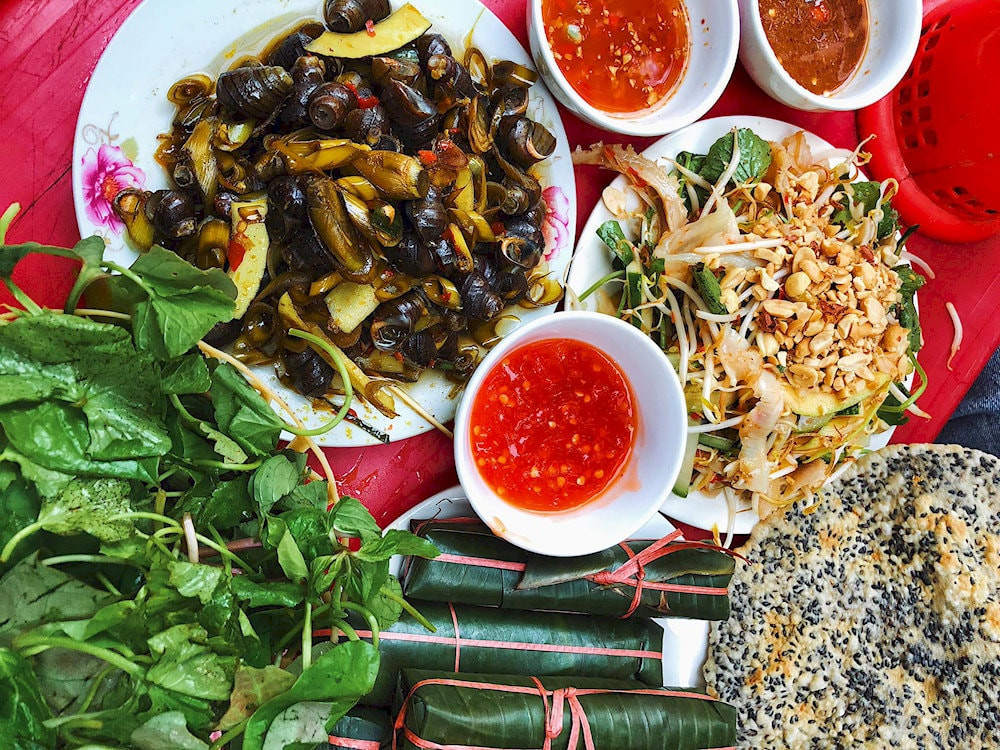 Ốc xào Nghệ An cay nồng, thơm mùi sả gừng