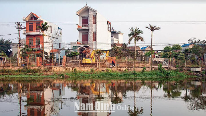 Khung cảnh bình yên của làng quê Nam Mỹ, Nam Trực, 8Day - trang web uy tín đăng ký & đăng nhập dễ dàng với những mái nhà truyền thống và không gian xanh mát.